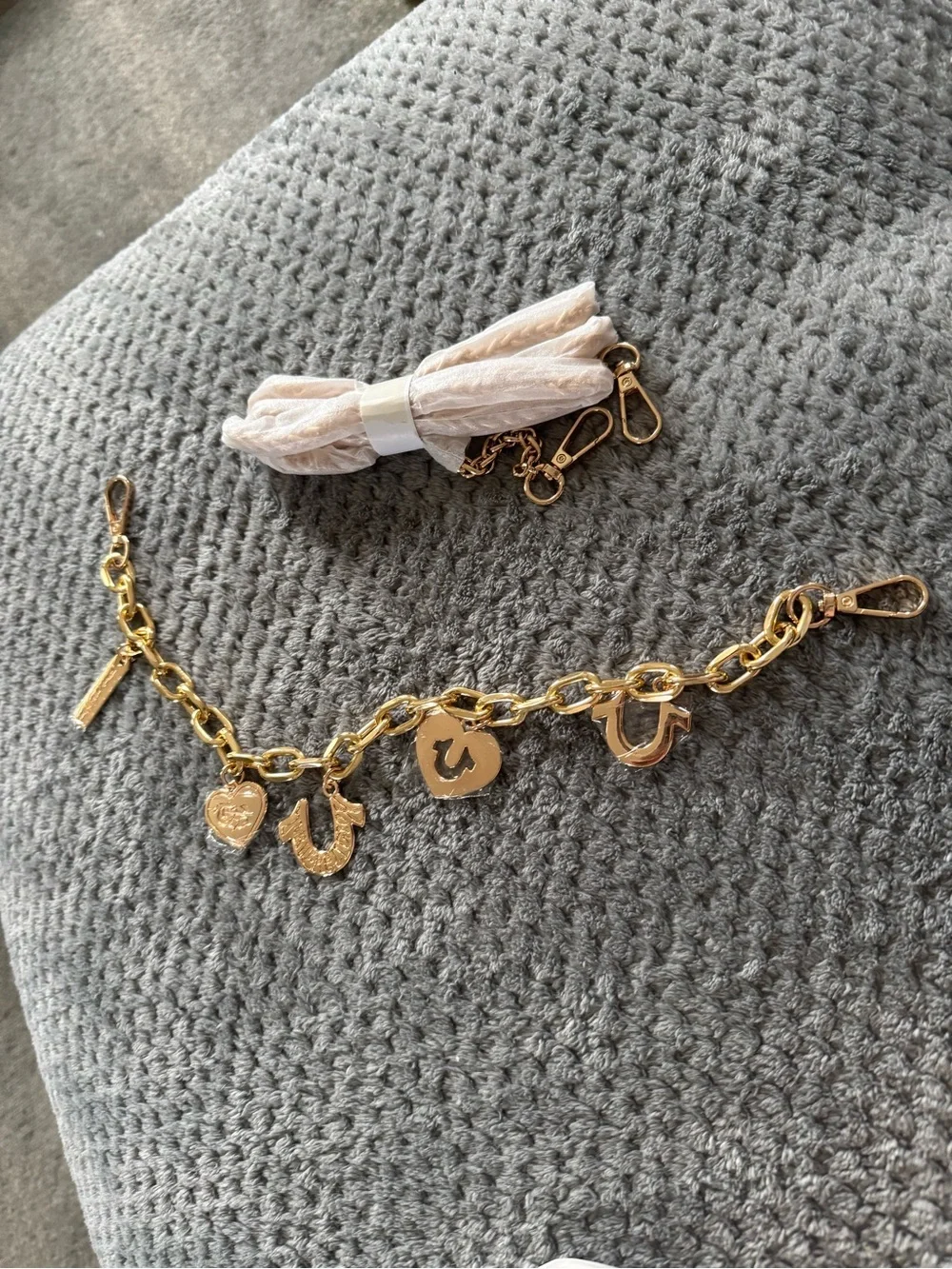 True Religion bag charm and purse handle